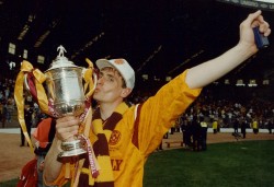 Motherwell's Tom Boyd celebrates the historic victory (copyright: The Herald)