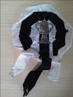 Joe’s rosette worn at Wembley in 1952.